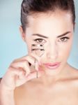 Pretty Woman Holding Tool For Eyelash Stock Photo