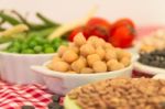 Variety Of Kitchen Ingredients With Fresh And Dried Legumes Stock Photo