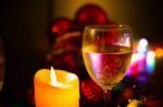 Two Glasses Of Champagne With A Christmas Decor In The Background Stock Photo