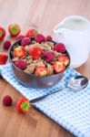 Bran Flakes With Fresh Raspberries And Strawberries And Pitcher Stock Photo