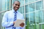 Happy Male Executive Posing To Camera Stock Photo