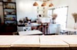 Selected Focus Empty Brown Wooden Table And Coffee Shop Or Resta Stock Photo