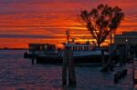 Venice Italy Sunset With Cruise Boat Stock Photo