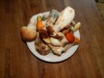 Collection And Preparation Of Autumn Edible Mushrooms Stock Photo