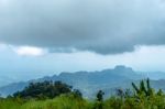 The Beauty Of The Sky When Light Hits The Clouds And Mountain Stock Photo