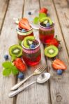 Red And Green Jelly Served With Fruit Stock Photo