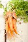 Baby Carrots Bunch Tied With Rope Stock Photo