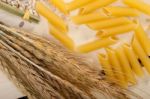 Italian Pasta Penne With Wheat Stock Photo