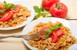 Italian Pasta Farfalle Butterfly Bow-tie And Tomato Sauce Stock Photo