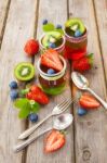 Red And Green Jelly Served With Fruit Stock Photo