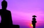 Silhouette Elephant With Tourist In Front Of Big Buddha At Sunse Stock Photo