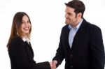 Business Man Welcoming A Women By Shake Hands Stock Photo