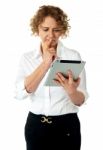 Businesswoman Looking At Ipad Stock Photo