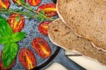 Baked Cherry Tomatoes With Basil And Thyme Stock Photo