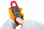 Hand Holding Clamp Multimeter Stock Photo