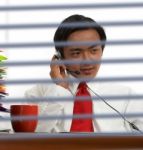 Businessman Communicating Online Stock Photo