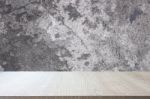 Top Of Wood Table On Old Concrete Wall Background Stock Photo