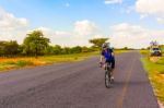 Man On The Bicycle In Africa Stock Photo