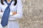 Working Woman On Wall Stock Photo