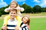 Smiling Family In Outdoors Stock Photo