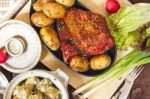 Potato Salad And Bacon Rib With Roasted Potatoes. Farmhouse Styl Stock Photo