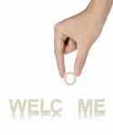 Hand fixing Welcome Word Stock Photo