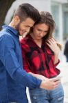 Young Couple Using Smart Phone Stock Photo