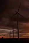 Wind Turbines At The Sunset Stock Photo