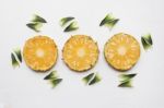 Slices Of Pineapple With Leaf Isolated Stock Photo