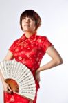 Chinese Model In Traditional Cheongsam Dress Stock Photo