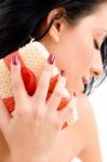 Top View Of Woman Scrubbing Her Neck On An Isolated Background Stock Photo