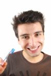 Cute Guy Washing His Teeth Stock Photo