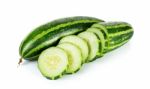 Striped Cucumber Isolated On The White Background Stock Photo