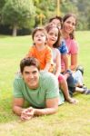 Portrait Of Happy Family Looking At Camera Stock Photo