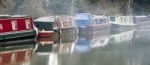 Narrow Boats On The River Wey Navigations Canal Stock Photo