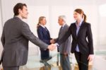 Business People Shaking Hands Stock Photo