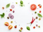 The Ingredients For Homemade Pizza On White Wooden Background Stock Photo