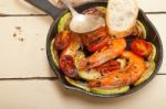 Roasted Shrimps With Zucchini And Tomatoes Stock Photo