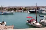 Assortment Of Boats In The Harbour At Latchi Stock Photo