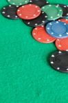 Poker Chips On Green Baize Casino Stock Photo