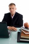 businessman With Apple And Books Stock Photo