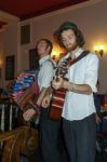 Folk Singers In A Restaurant In Berlin Stock Photo