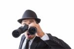 Businessman Using Binoculars Stock Photo