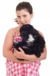 Girl Holding Dog Stock Photo