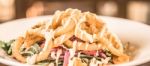 Deep Fried Calamari Rings And Salad Stock Photo