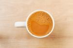 Hot Milk Tea In A White Cup On Table Stock Photo