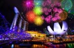 Singapore Cityscape And Firework At Night In Singapore Stock Photo