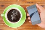 Coffee Cup And Smartphone Stock Photo