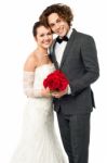 Beautiful New Bridegroom Smiles For The Camera Stock Photo