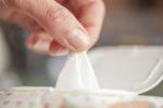 Hand Picked A Wet Wipes In Package Box, Wet Wipes In A Woman's H Stock Photo